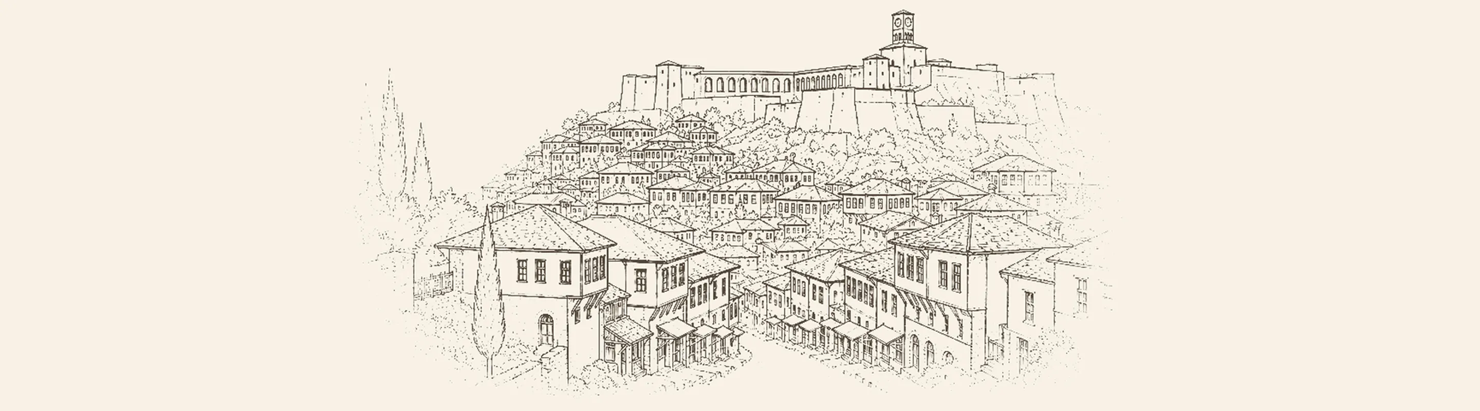 Gjirokastër'in taş çatılı eski şehri ve tepedeki kalesi